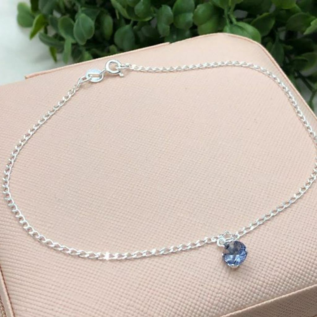 Tornozeleira de prata 925 ponto de luz roxo