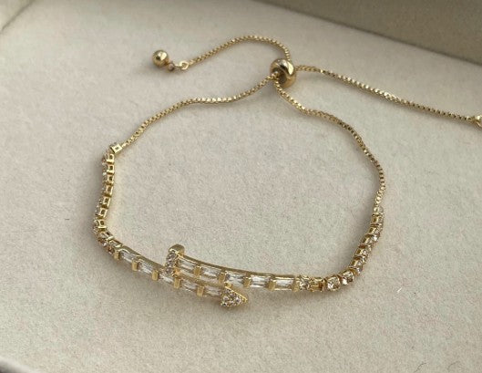 Pulseira gravatinha prego de zircônias banhado a prata e ouro18k